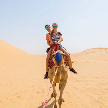 Couple Camel Riding Desert safari deals